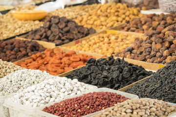 Dried fruits and nuts on local food market in Tashkent, Uzbekistan