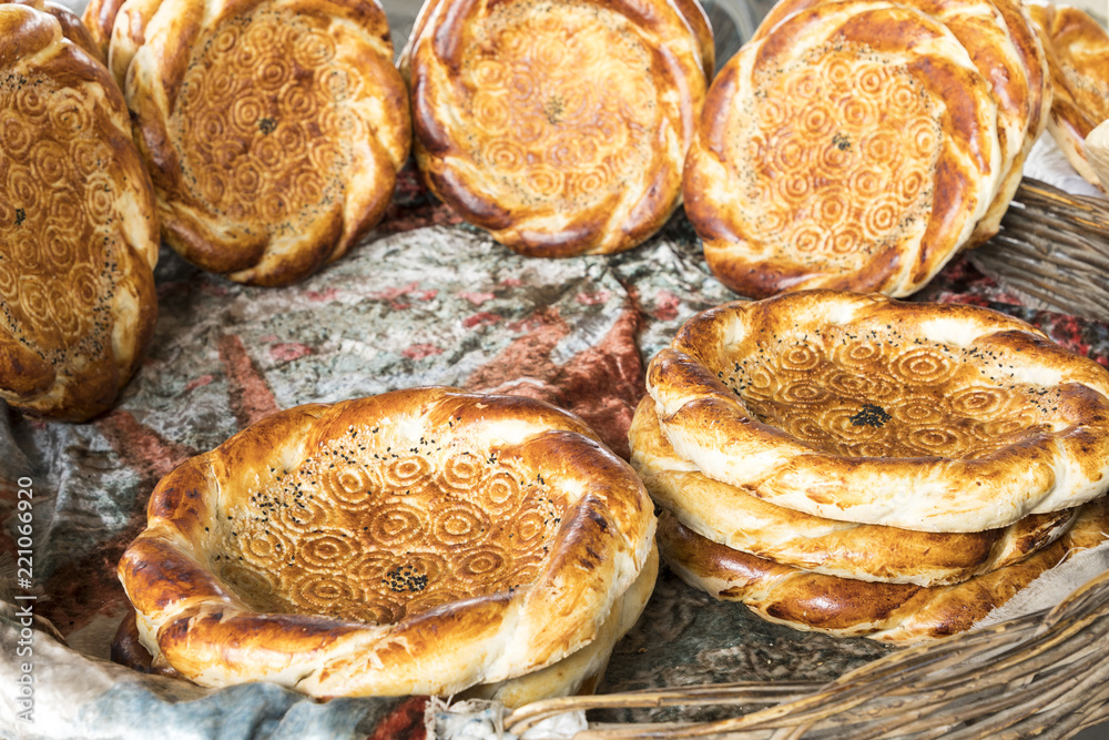 Wall mural Traditional uzbekistan bread lavash at local bazaar, is a soft flat-bread of Middle Asia (Uzbekistan).