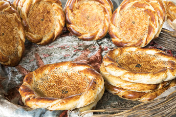 Traditional uzbekistan bread lavash at local bazaar, is a soft flat-bread of Middle Asia (Uzbekistan).