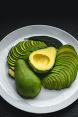 Fresh Avocado Slide In white plate