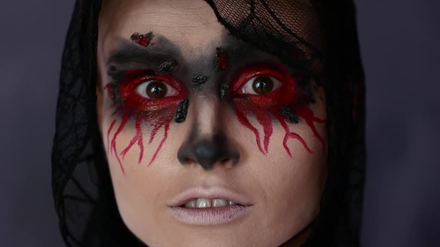 Woman in make-up. Halloween image.