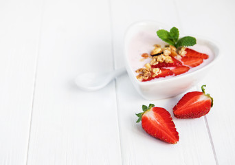 Bowl with strawberry yogurt