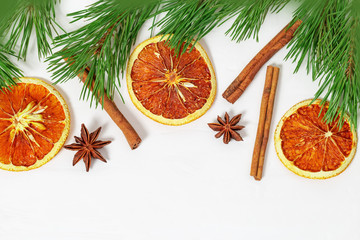 Fragrant Spices for mulled wine, cinnamon, anise, sliced oranges.  Top view. Holiday background with copy space.