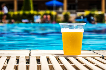 Swimming pool and beer