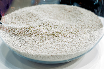 Different granules of glass flasks.