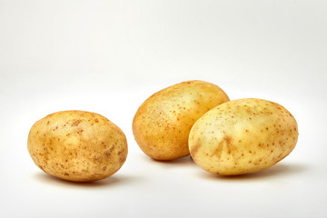 Potatoes. Fresh natural potatoes isolated on white background.