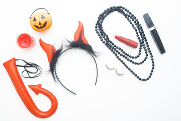 Creative flat lay Halloween fashion set for woman on white background