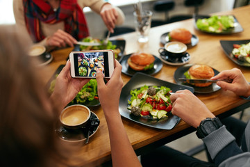 Photo On Phone. Closeup Woman Hands Photographing Food