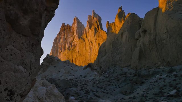 Sunny morning in the Valley of chalk Castles in Kasakhstan. 4K tracking shot of the Airakty-Shomanai mountains.