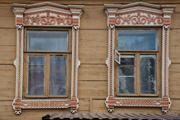 Windows with carvings of old wooden house