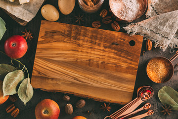 Empty cutting board and ingredients for baking