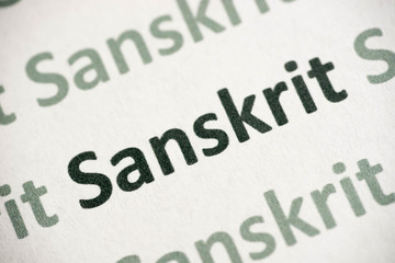 word Sanskrit language printed on paper macro