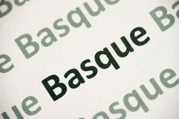 word Basque  language printed on paper macro
