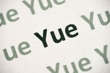 word Yue language printed on paper macro