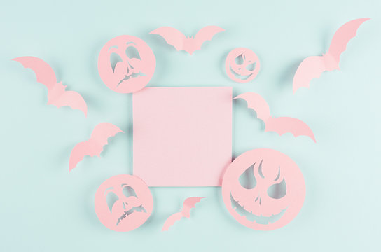 Halloween advertising mock up - pink blank sale card with soar bats and funny scary monsters faces on candy pastel green background.