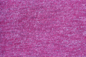 burgundy knitted background texture, close-up