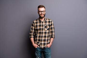 Obraz premium Charming man in spectacles and street style casual wear look at 