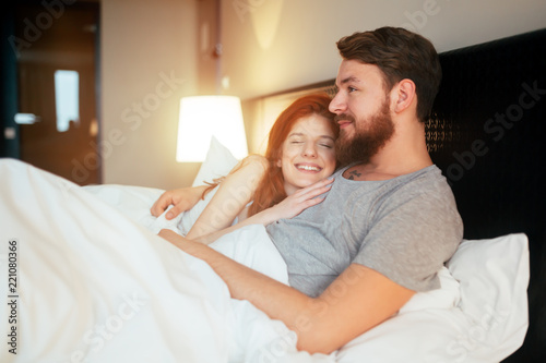 Sensual Couple In Bed Being Romantic Stock Photo And
