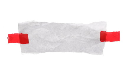 Crumpled paper with red tape isolated on white background, clipping path