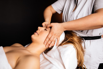 Fototapeta na wymiar Beautiful woman enjoying massage