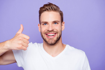 Close-up portrait of handsome cheerful attractive bearded conten