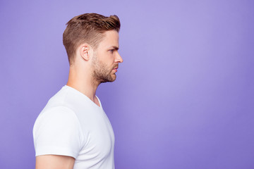 Profile side view of handsome bearded minded street style guy, i