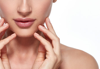 Obraz na płótnie Canvas Lips nose neck woman closeup with hand chin