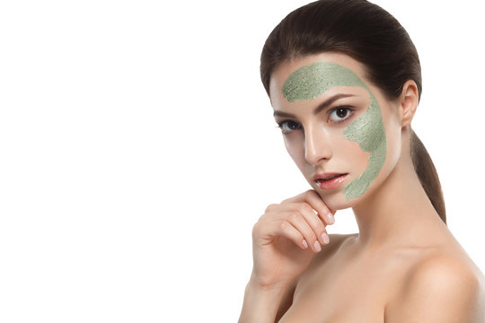 Woman with cosmetic scrab mask on face.