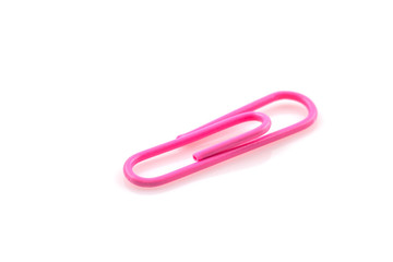 Single Pink paper clip isolated on white