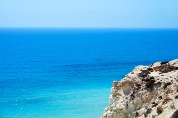 Beautiful seascape with a cliff over sea in sunny summer day not far from the city of Paphos in Cyprus
