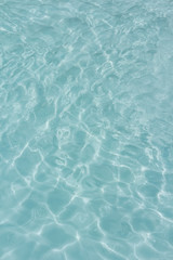 light blue water  texture pattern in swimming pool