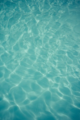 light blue water  texture pattern in swimming pool
