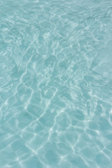 light blue water  texture pattern in swimming pool