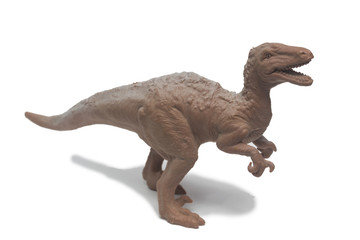 Toy Dinosaurs are made of plastic isolate on white
