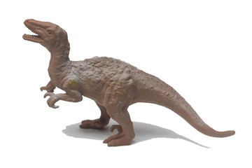 Toy Dinosaurs are made of plastic isolate on white
