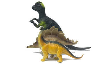 Naklejka premium Toy Dinosaurs are made of plastic isolate on white 