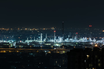 Fototapeta na wymiar Aerial view of huge silver light industrial area line isolated on city night view background.