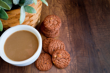 Homemade Chocolate Cookies Eat with hot Coffee on wooden background