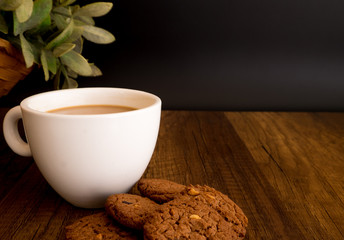 Homemade Chocolate Cookies Eat with hot Coffee on wooden background