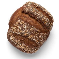 A loaf of buckwheat bread on a white background