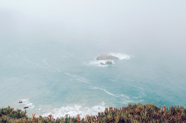 Coast of Portugal, Cape Cabo da Roca - the westernmost point of Europe. Ocean waves  - 221087548