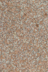 Granite texture of old wall of polished pink granite