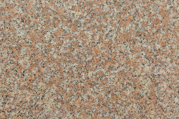 Granite texture of old wall of polished pink granite