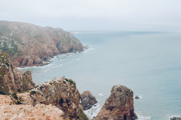 Coast of Portugal, Cape Cabo da Roca - the westernmost point of Europe. Ocean waves  - 221087571