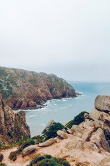 Coast of Portugal, Cape Cabo da Roca - the westernmost point of Europe. Ocean waves  - 221087767