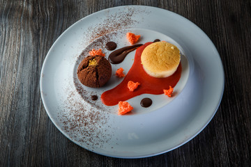 top view of delicious truffle dessert of with sauce decoration