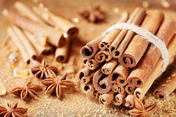 Christmas spices. Anise star, cinnamon sticks and brown sugar.