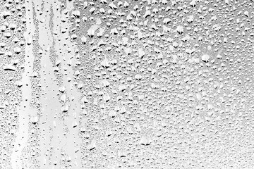 texture of a drop of rain on a glass wet transparent background