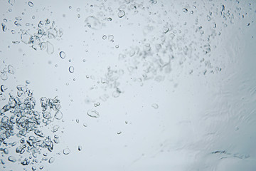 underwater texture air bubbles diving / view from under the water up, underwater background