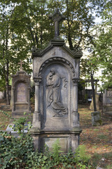 Fototapeta premium Historic Statue on the mystery old Prague Cemetery, Czech Republic
